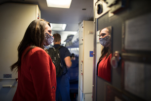 southwest-airlines-flight-attendant-welcoming-customers-during-t