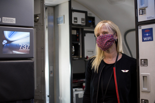 southwest-airlines-flight-attendant-welcoming-customers-during-t